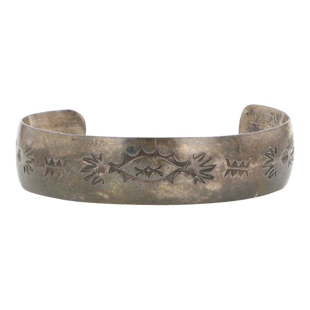 Vintage Navajo Stamp-Work Bracelet: Sterling Silver | | Vintage Navajo Stamp-Work Bracelet | Navajo Native American Southwest Indian Jewelry | Good (no breaks or damages) | Approximate Weight: 22 Grams | Bracelet: 4.25" inner, 1.25" gap