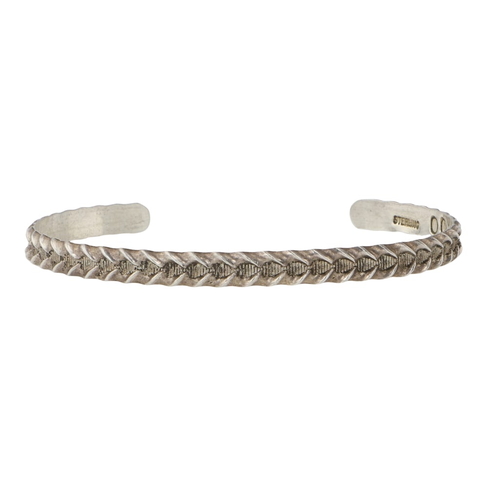 Navajo Stamp-Work Bracelet: Sterling Silver | | Navajo Stamp-Work Bracelet | Navajo Native American Southwest Indian Jewelry | Good (no breaks or damages) | Approximate Weight: 5 Grams | Bracelet: 5" inner, 1" gap, 6" total, .25