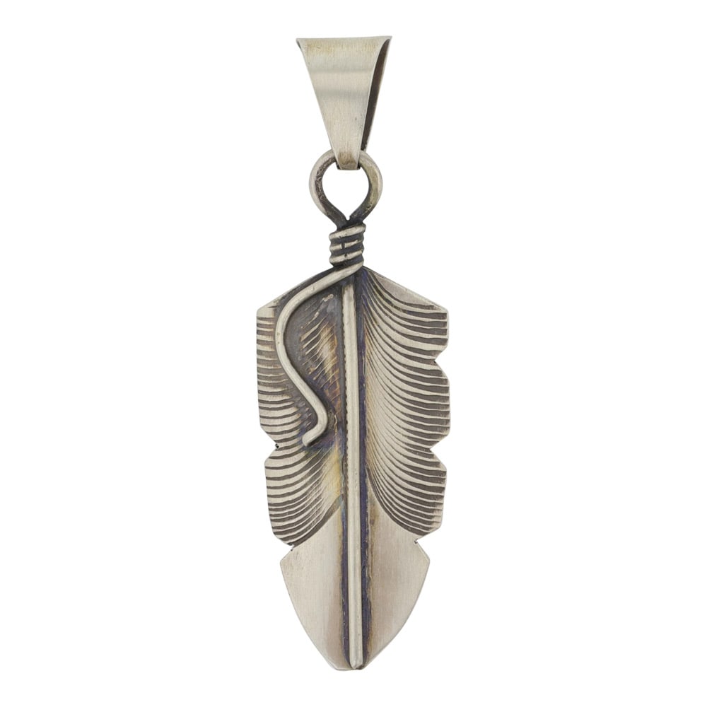 Chris Charley Navjao Plain Silver Feather Pendant: Sterling Silver | | Chris Charley Navjao Plain Silver Feather Pendant | Navajo Native American Southwest Indian Jewelry | Good (no breaks or damages) | Approximate Weight:?5?Grams | Pendant: 2.5" x .7