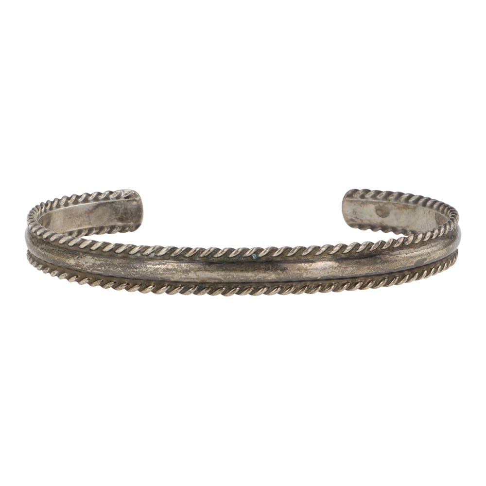 Vintage Navajo Plain Silver Cuff Bracelet: Sterling Silver | | Vintage Navajo Plain Silver Cuff Bracelet | Navajo Native American Southwest Indian Jewelry | Good (no breaks or damages) | Approximate Weight: 14 Grams | Bracelet: 5.25" inner, 1"