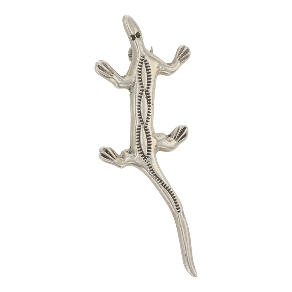 Vintage Navajo Plain Silver Lizard Pin: Sterling Silver | | Vintage Navajo Plain Silver Lizard Pin | Navajo Native American Southwest Indian Jewelry | Good (no breaks or damages) | Approximate Weight: 4 Grams | Pin: 2" x .75" |