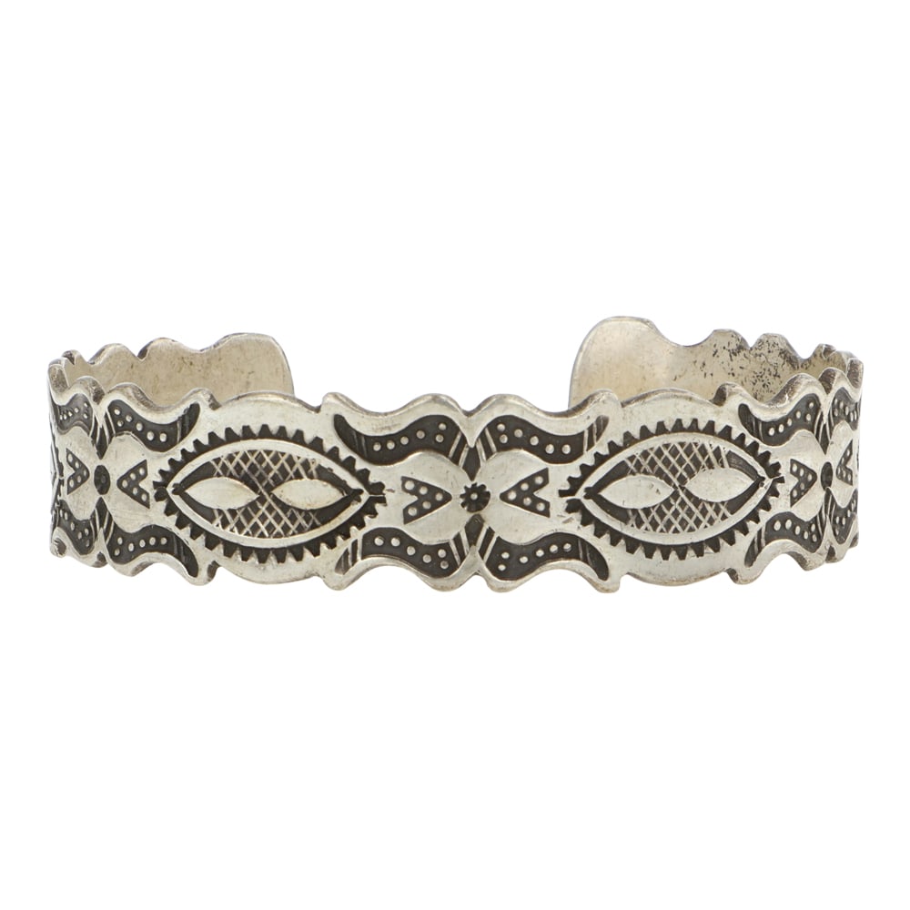 Vintage Navajo Detailed Stamp Work Cuff Bracelet: Sterling Silver | | Vintage Navajo Detailed Stamp Work Cuff Bracelet | Navajo Native American Southwest Indian Jewelry | Good (no breaks or damages) | Approximate Weight: 20 Grams | Bracelet: 5.25" in