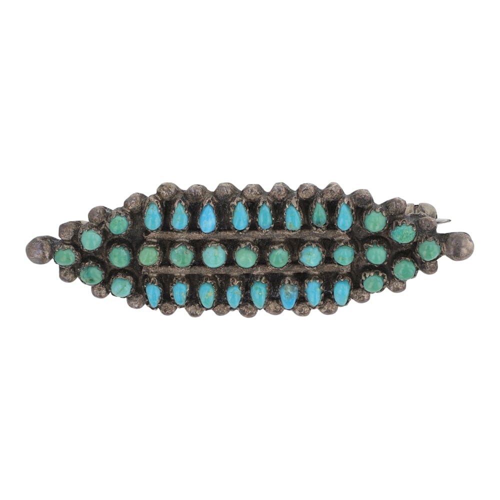 Vintage Zuni Turquoise Pin: Sterling Silver | Genuine Turquoise | Vintage Zuni Turquoise Pin | Zuni Native American Southwest Indian Jewelry | Good (no breaks or damages) | Approximate Weight: 4 Grams | Pin: 1.75" x .5" |