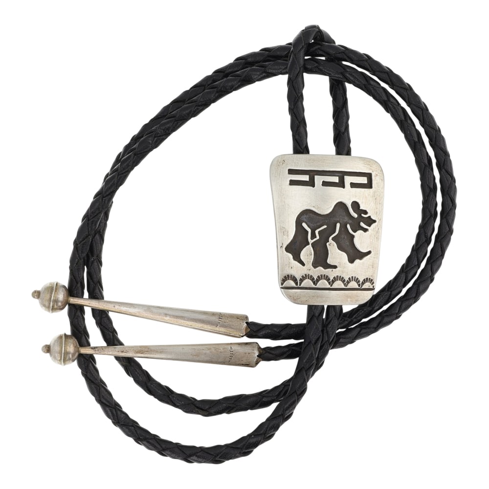 Vintage Navajo Plain Silver Bear Bolo Tie: Sterling Silver | | Vintage Navajo Plain Silver Bear Bolo Tie | Navajo Native American Southwest Indian Jewelry | Good (no breaks or damages) | Approximate Weight: 28 Grams | Bolo: 19" length, 1.5" x