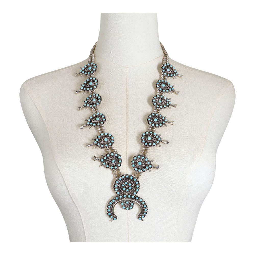 Lester James Zuni Sleeping Beauty Turquoise Large Petit Point Squash Blossom Necklace: Sterling Silver | Genuine Sleeping Beauty Turquoise | Lester James Zuni Sleeping Beauty Turquoise Large Petit Point Squash Blossom Necklace | Zuni Native American Southwest Indian Jewelry | Good (no b