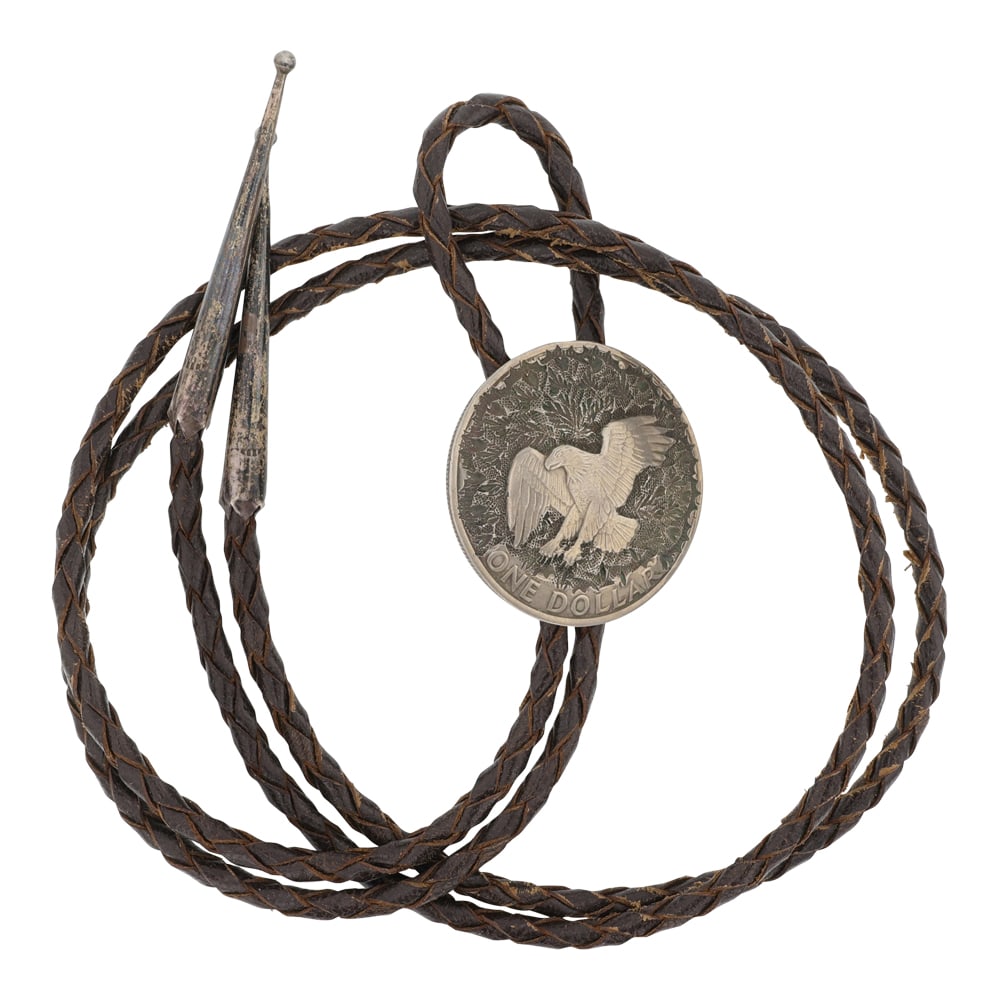 Vintage Navajo Eisenhower Dollar Bolo Tie: Sterling Silver | | Vintage Navajo Eisenhower Dollar Bolo Tie | Navajo Native American Southwest Indian Jewelry | Good (no breaks or damages) | Approximate Weight: 40 Grams | Bolo: 22" length, 1.5" x 