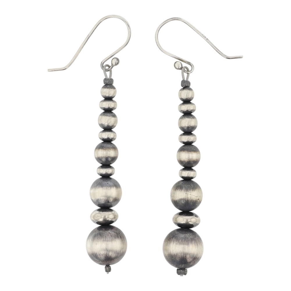 Navajo Oxidized Beads Graduated Earrings: Sterling Silver | | Navajo Oxidized Beads Graduated Earrings | Navajo Native American Southwest Indian Jewelry | Good (no breaks or damages) | Approximate Weight: 5 Grams | Earrings: 1.75" x .5" each 