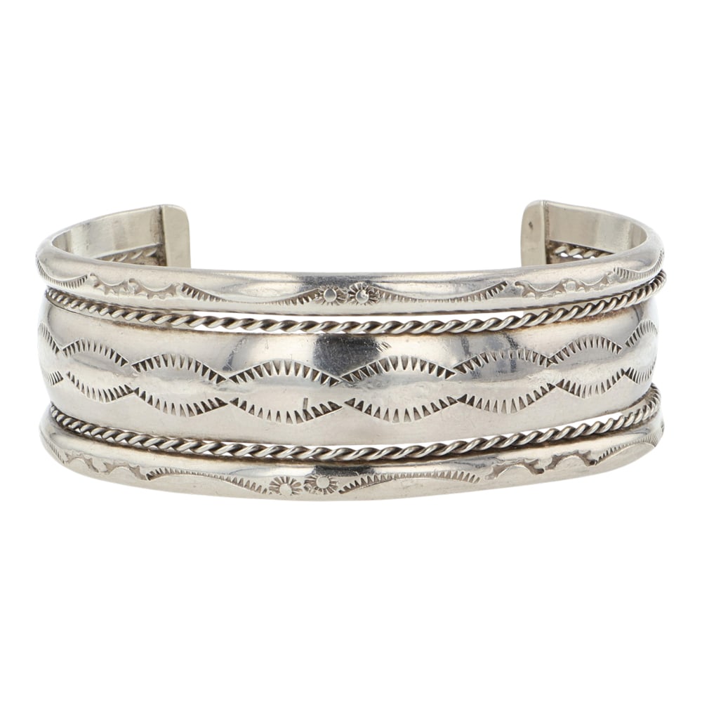 Vintage Navajo Plain Silver Stamp-Work Bracelet: Sterling Silver | | Vintage Navajo Plain Silver Stamp-Work Bracelet | Navajo Native American Southwest Indian Jewelry | Good (no breaks or damages) | Approximate Weight: 40 Grams | Bracelet: 5.25" inn