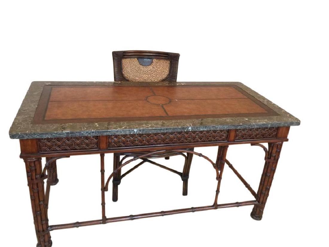 Rattan Desk & Chair: Rattan Desk & Chair. Desk with marble surround and hand tooled leather top. Decorative work in the front of the desk with the lattice pattern an opening The rattan design desk is a great vers