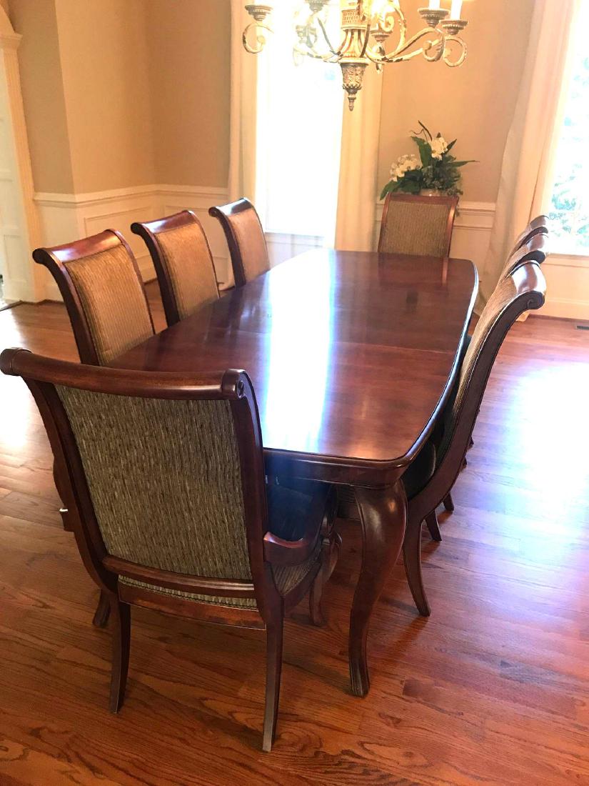 Pennsylvania House 9 Piece Solid Cherry Dining: Pennsylvania House solid cherry luxurious dining table and 2 leaves. Elegant Queen Anne legs and rich wood tone creates an elegant form to entertain. The waterfall drop skirt under the table finishes