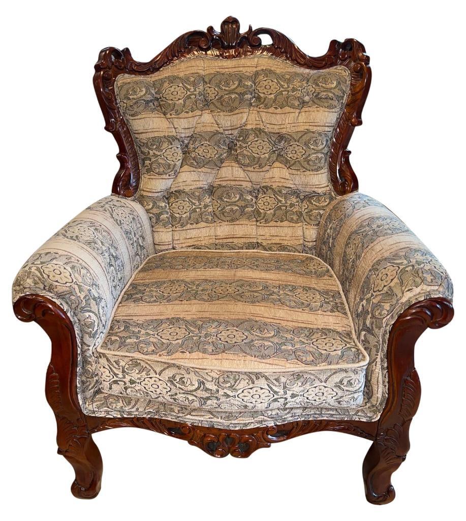 French Baroque Arm Chair: French Baroque Arm Chair. This arm chair has exquisite carving on the seat back, the arms and the seat support. The upholstery is beige, sage, and gray.in a vine and flowers stripe. Matches lot 5