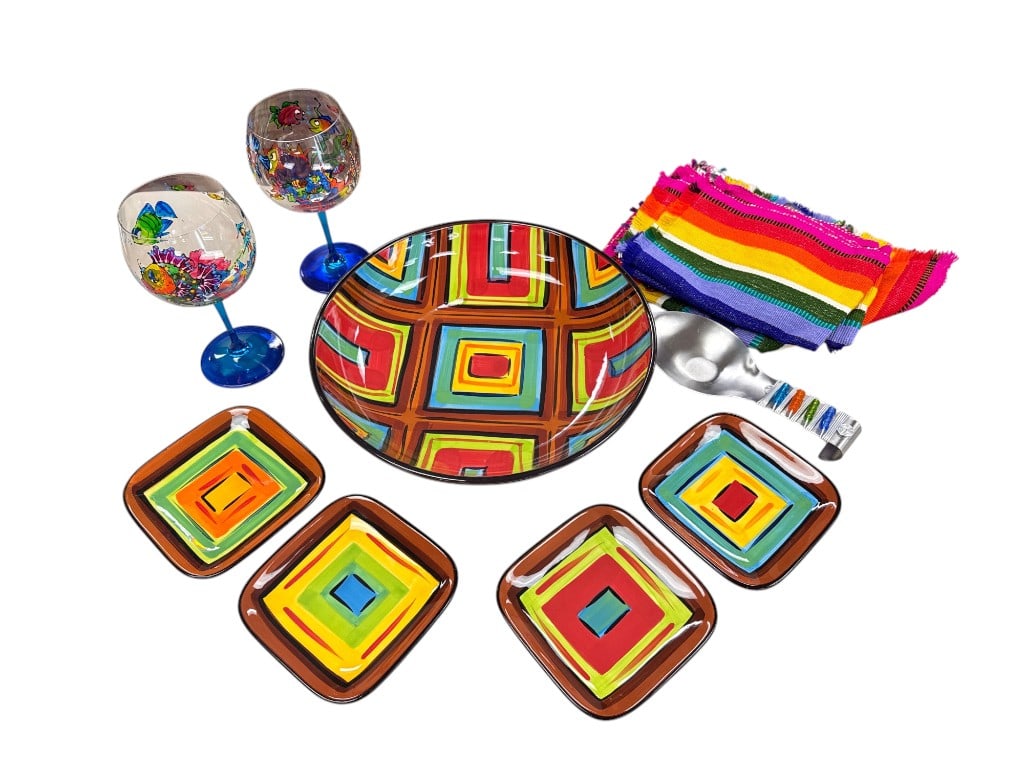 This Southern Living at Home serveware set features the multicolored geometric pattern designed by G: This Southern Living at Home serveware set features the multicolored geometric pattern designed by Gail Pittman, known for vibrant, eye-catching decor. The collection includes a large rounded bowl, fo