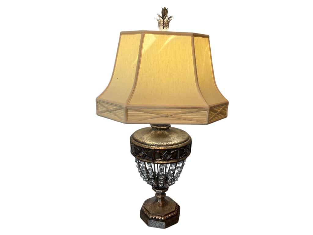 Decorative Metal and Crystal Table Lamp with Fabric Shade, 41"H: Table lamp featuring a decorative metal base with antiqued gold finish details and clear crystal accents. The urn-shaped body displays hanging faceted crystals beneath a textured metal band. An off-wh