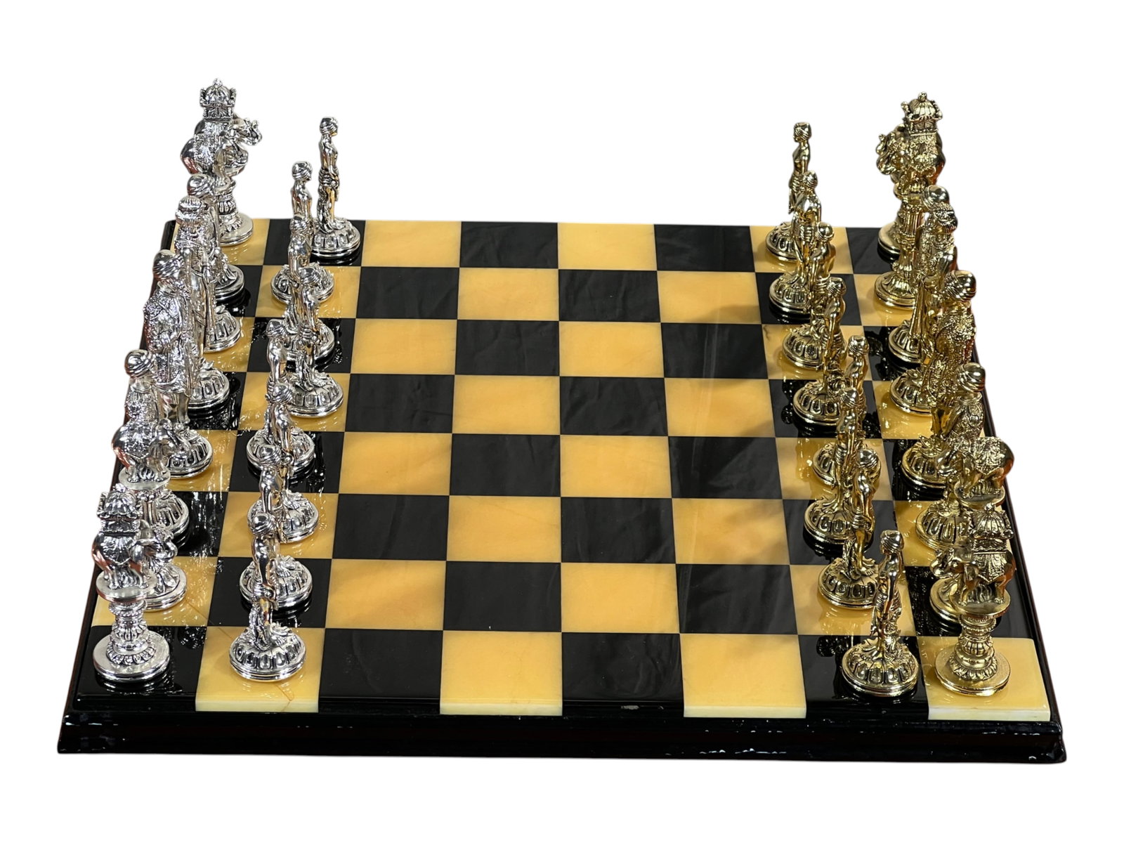 $3,000 Italian Silver-Plated and Gold-Plated Figural Chess Set with Marble Board, Florence: This magnificent Italian chess set presents a complete array of Renaissance-inspired figural pieces in contrasting silver-plate and gold-plate finishes, displayed on a striking black and gold marble b