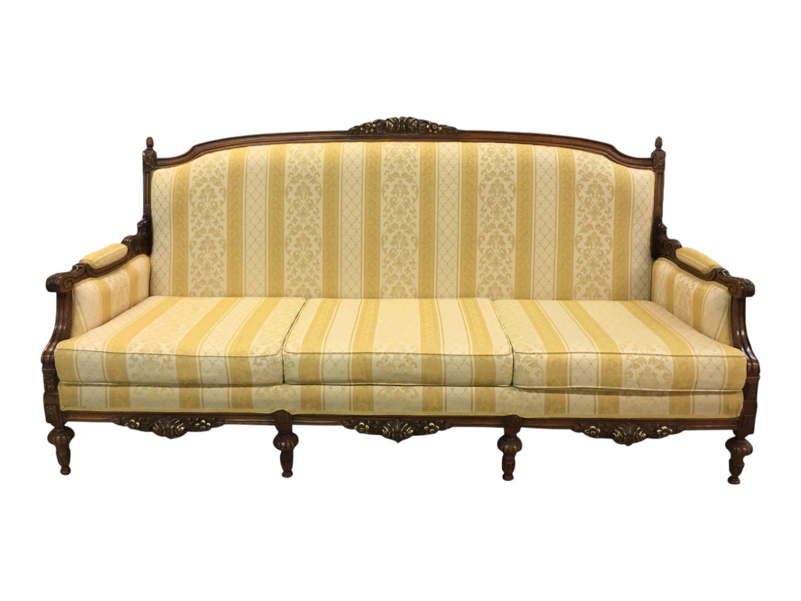 $6,500 Handcrafted Italian Walnut Sofa in Gold Damask Stripe Upholstery, Bergamo Region: This elegant Italian sofa pairs a finely carved walnut frame with sumptuous gold striped damask upholstery, handcrafted in the celebrated Bergamo region — a cornerstone of Italian furniture-making t