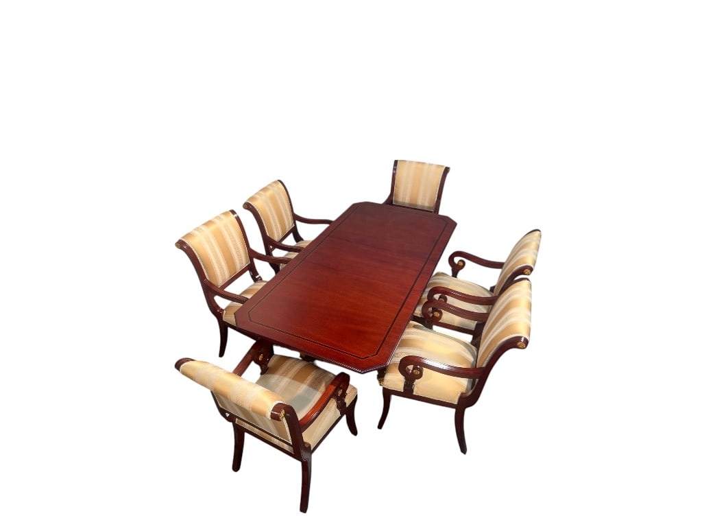 $6,500 Elegant Empire Mahogany Dining Table Set with Six Chairs: $6,500 Mahogany dining table set, featuring an elegant rectangular table with fluted details and Grecian motifs. The tabletop showcases a rich, lustrous finish. Accompanied by six armchairs, each