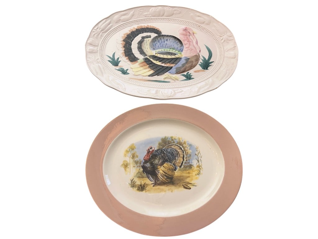 Vintage Japanese Turkey Serving Platters – Embossed and Painted Ceramic (Set of 2): Set of two vintage ceramic serving platters from Japan, each showcasing a distinctive turkey motif. The first platter features a raised, embossed turkey in vibrant hand-painted colors on an oval plate