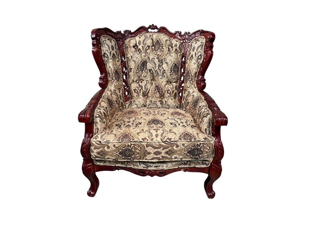 Mahogany Frame Wingback Armchair with Paisley Upholstery: This wingback armchair features a richly carved mahogany frame showcasing traditional craftsmanship in its scrolling details along the crest rail, armrests, and cabriole legs. The frame’s high-gloss