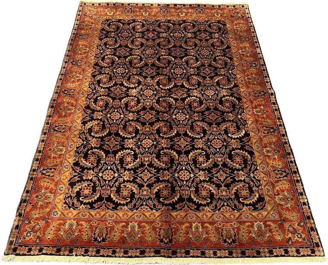 Noblehouse Hand-Knotted Wool Rug, 5'0" x 7'2": Elegant hand-knotted wool rug featuring a sophisticated all-over floral pattern on a deep black field. The intricate design showcases warm terracotta, gold, and sage accents throughout, complemented b