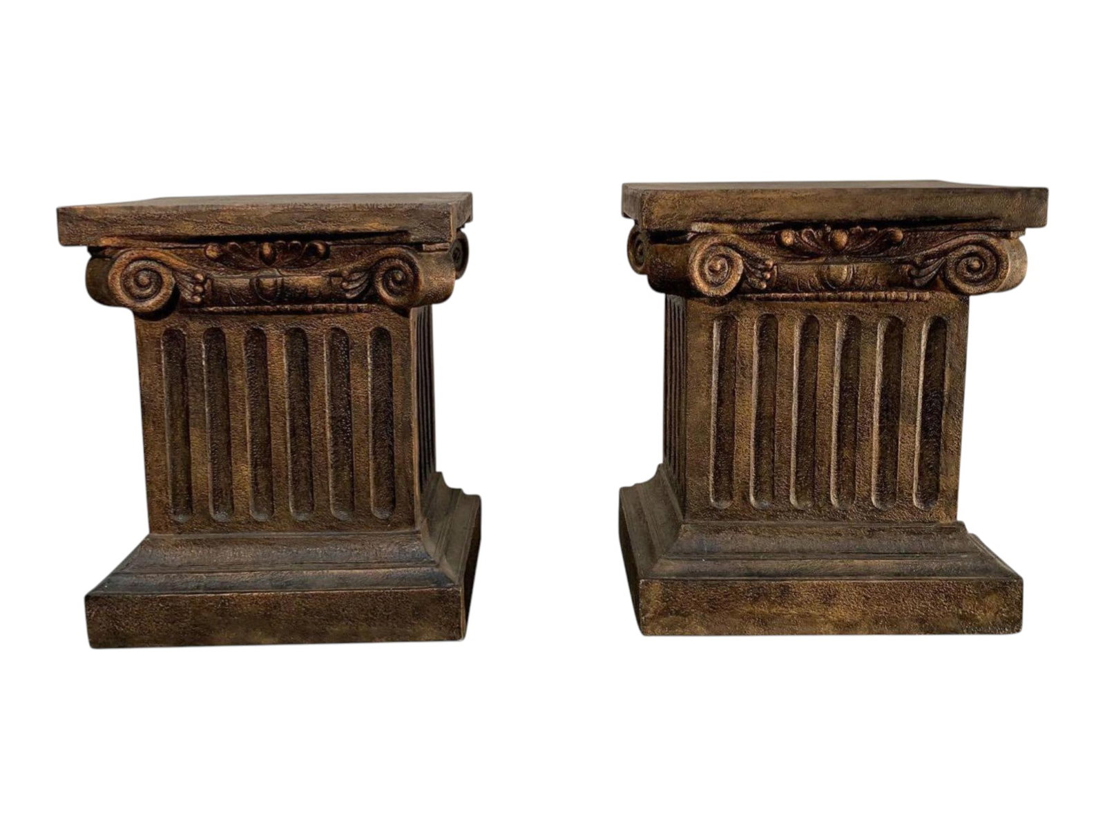 Pair of Classical Ionic Column Pedestals with Bronze Finish: Architectural pedestals featuring classical Ionic design with fluted columns and ornate volute scrolls. Each pedestal showcases traditional vertical fluting, decorative carved capitals with scrollwork