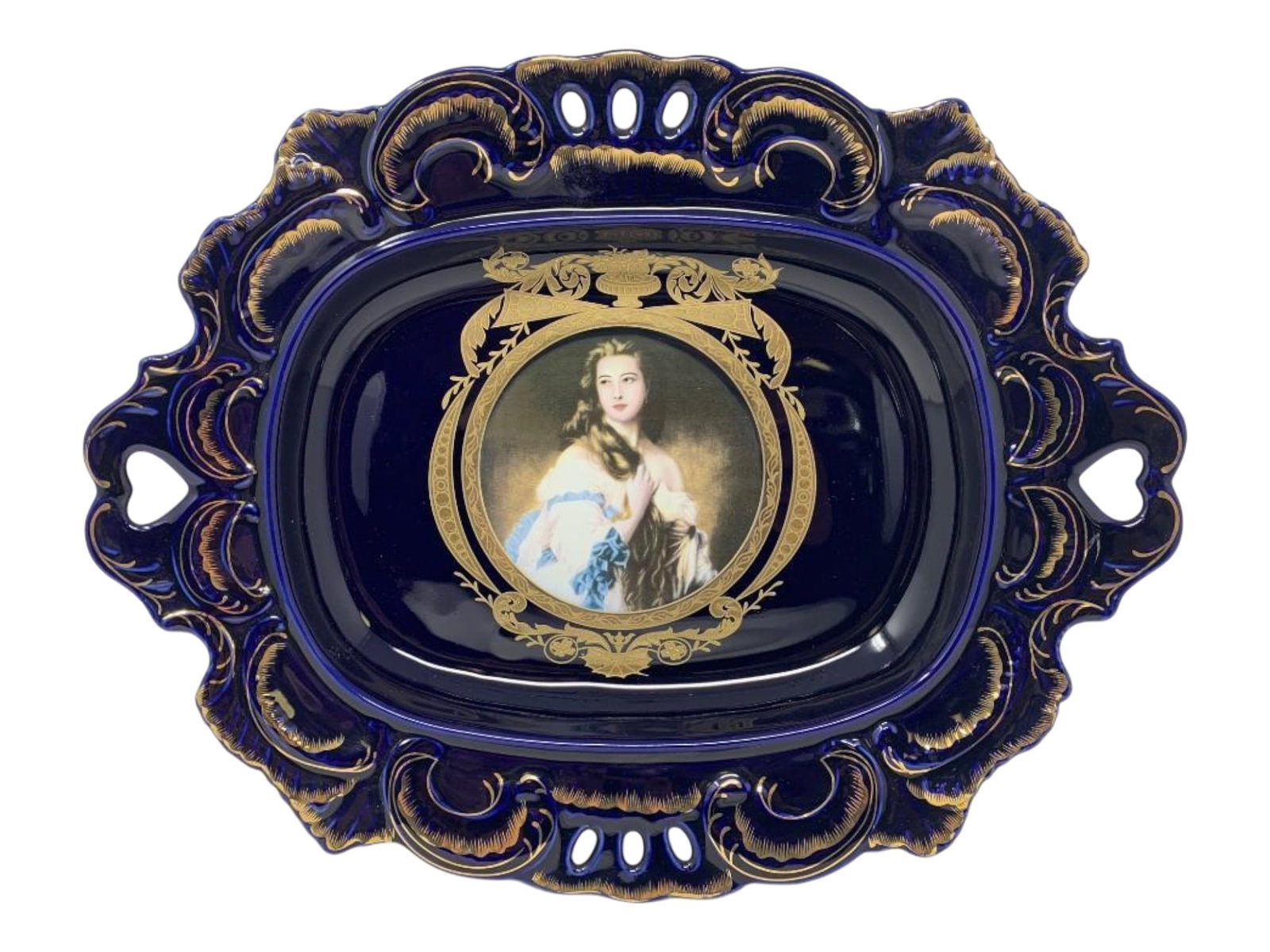 Cameo Cobalt Porcelain Ice Cream Tray: Cameo Cobalt Porcelain Ice Cream Tray. The center medallion of this tray is a portrait of a Georgian lady with long hair. This pierced porcelain server has heart shaped punches for the handles and