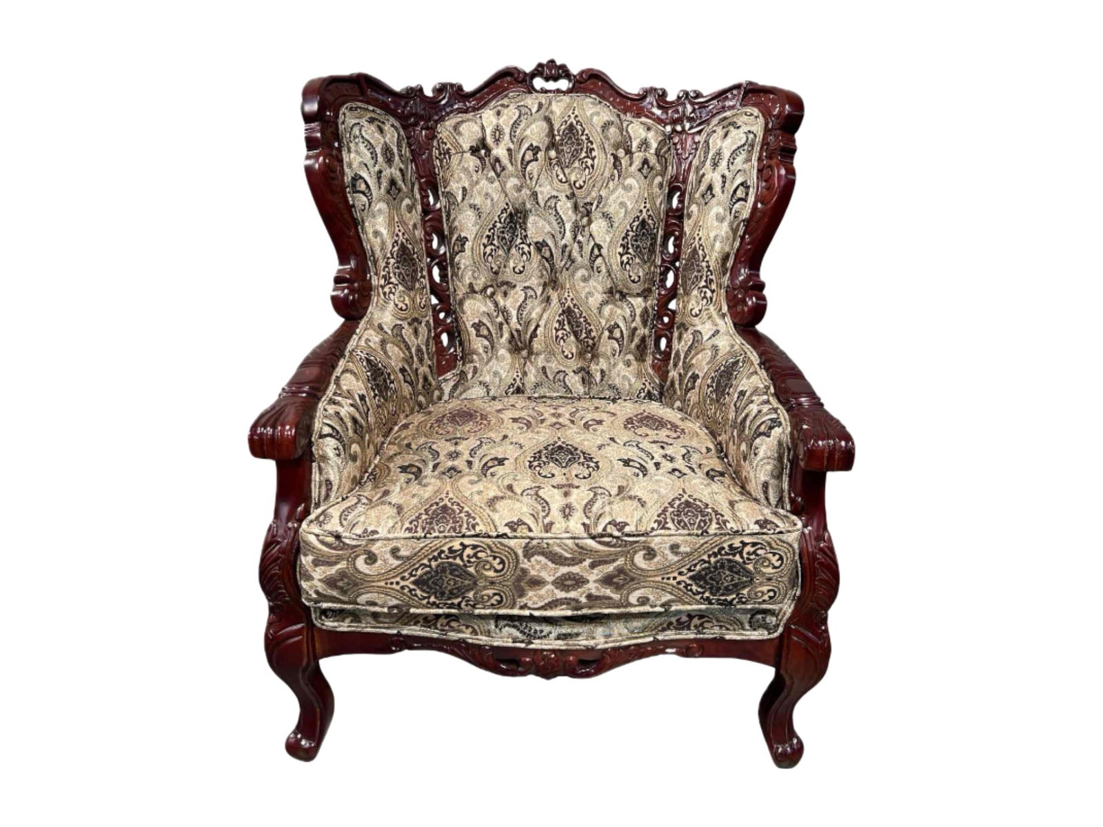 Carved Mahogany Upholstered Armchair with Jacquard Fabric: This armchair features a richly carved mahogany frame with intricate floral and scroll motifs on the arms, legs, and backrest crest. Upholstered in a jacquard fabric showcasing an ornate paisley and
