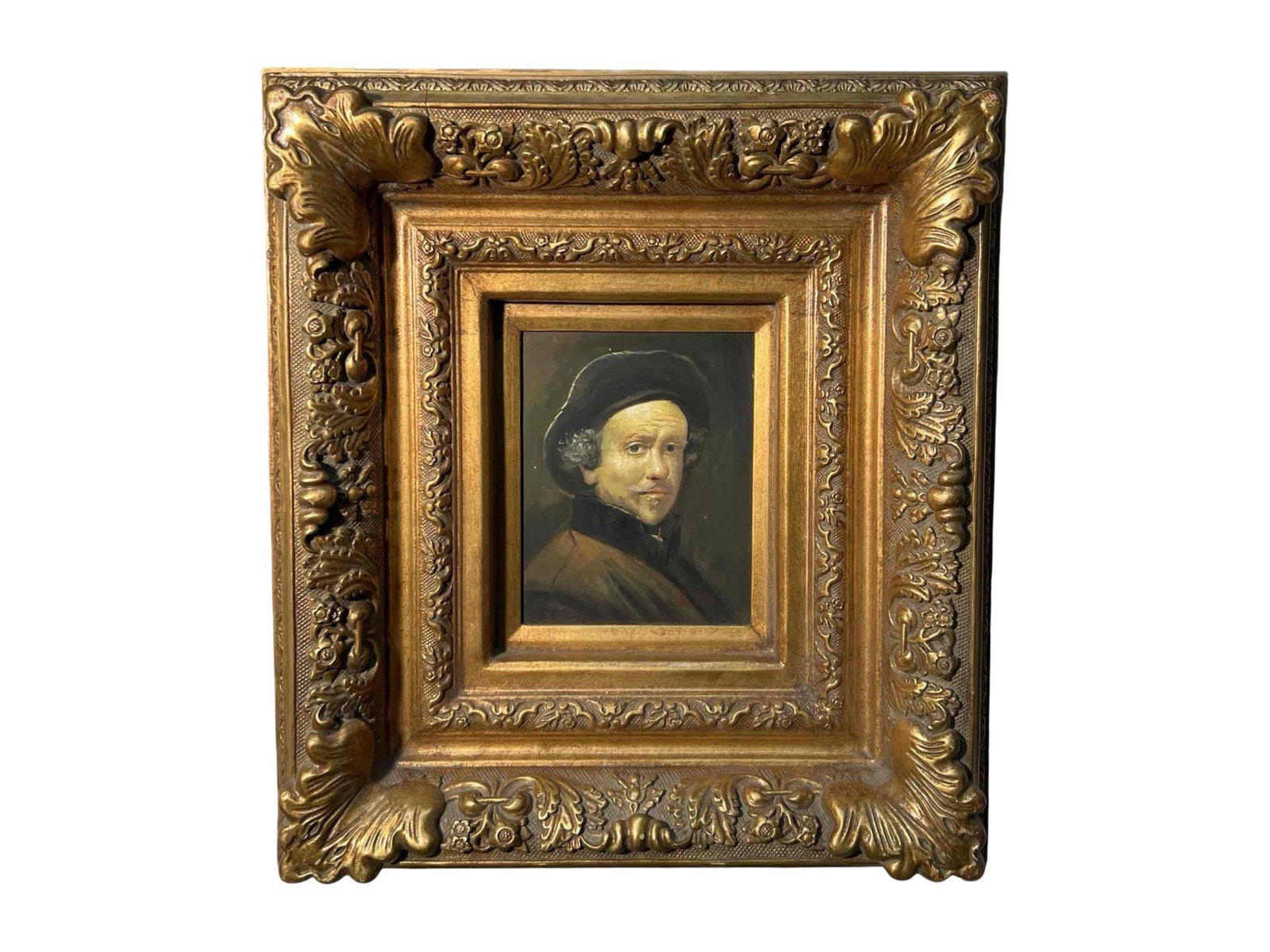 Portrait Painting in Ornate Gilt Carved Wood Frame: This portrait painting features a gentleman with curly hair and a mustache, dressed in a dark hat and brown coat, presented in a richly detailed gilt wood frame. The frame is elaborately carved with d
