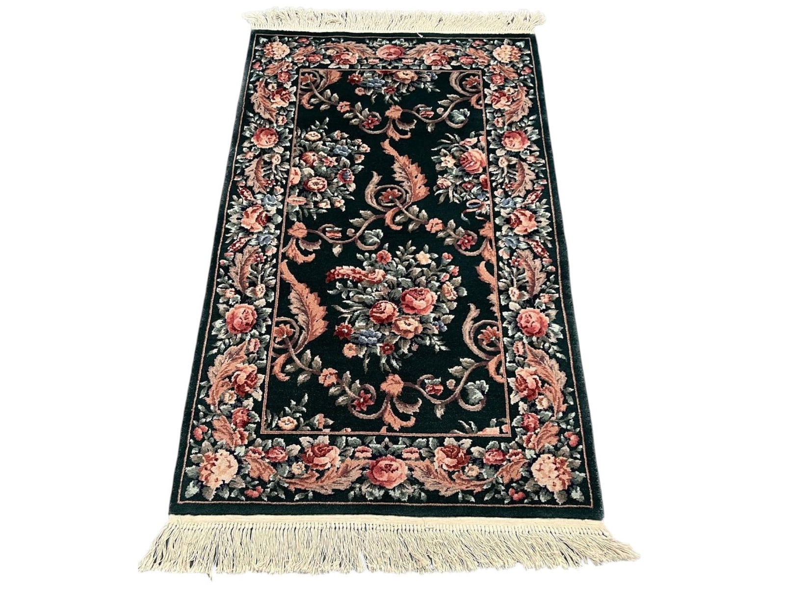$1,245 - Forest Green Rose Bouquet Rug, Aubusson-Style Floral Design, Hand-Knotted Wool, 3'0" x 5'0": $1,245. Deep forest green sets off cascading bouquets of pink and salmon roses, blue-grey foliage and scrolling acanthus, wrapped by a matching flowered border and finished with cream fringe. The voca