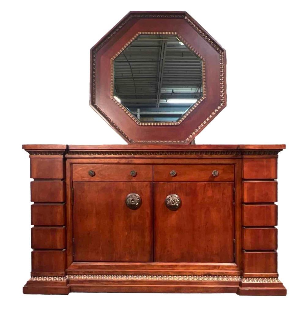 Neoclassical Stepped-Pilaster Dresser with Octagonal Mirror: A well-built two-piece bedroom set comprising a neoclassical-style dresser and its matching octagonal mirror, in warm cherry-toned wood with gilt-highlighted carved detail. The construction is notably