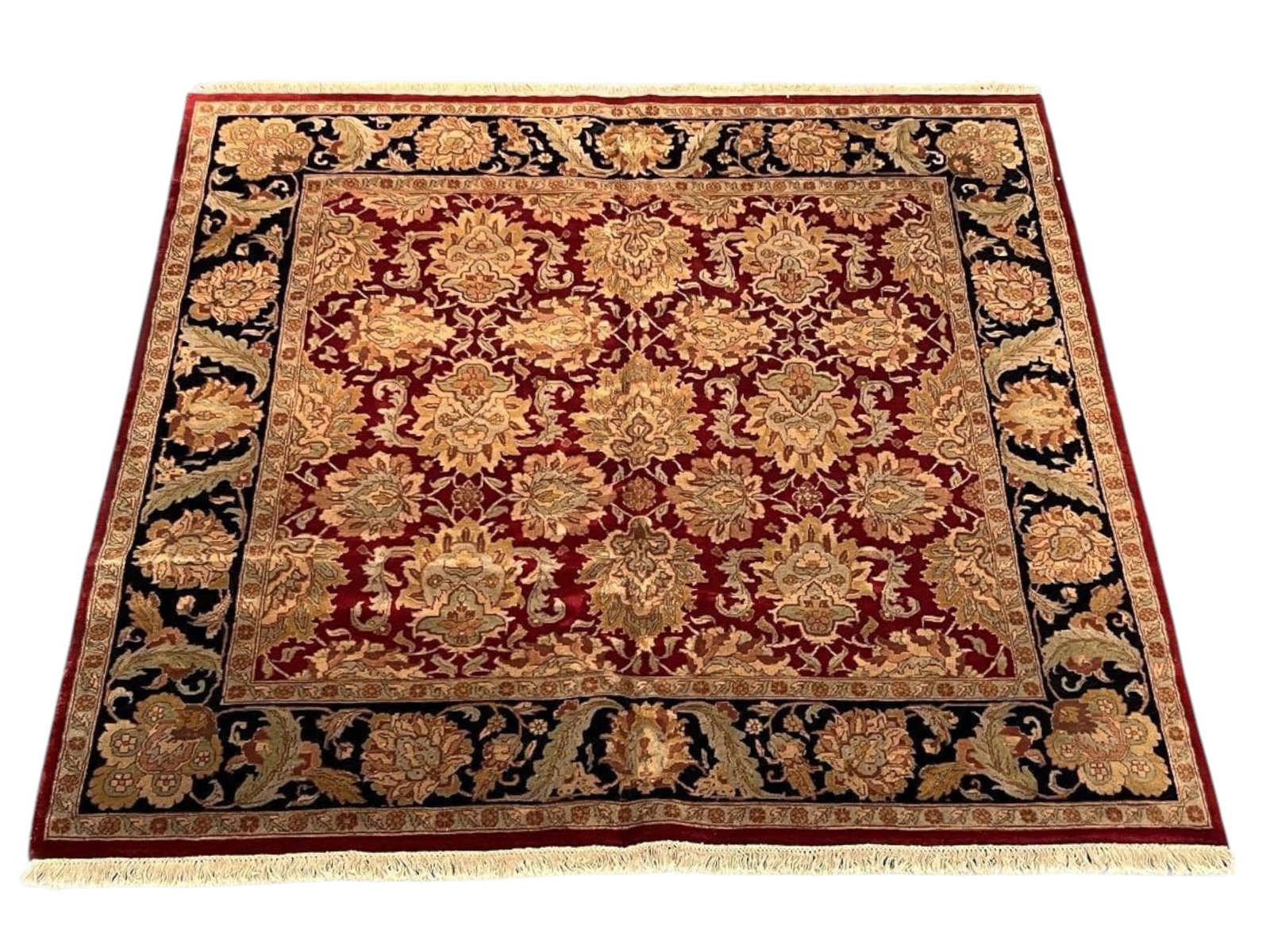 $4,530 - Square Format Burgundy and Gold Carpet, Khorasan Design, Hand-Knotted Wool, 7'7" x 7'9": $4,530. The burgundy field is filled with a symmetrical lattice of golden palmettes and blossoms, framed by a deep black border of scrolling gold vine, in a genuinely square format. Squares are