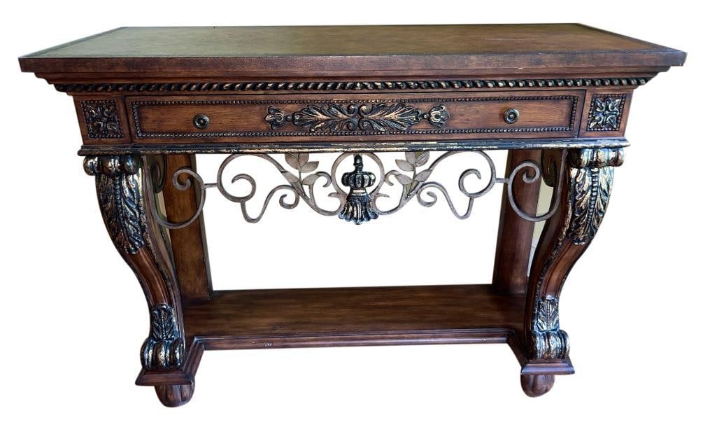 Handsome Tooled Leather Console w/Scoll Metal Accent Detail: Handsome Tooled Leather Console w/Scroll Metal Accent Detail Small chip in the corner, easily cover with a bit of stain. Versatile piece as a sofa table or for use in the foyer. 45 X19