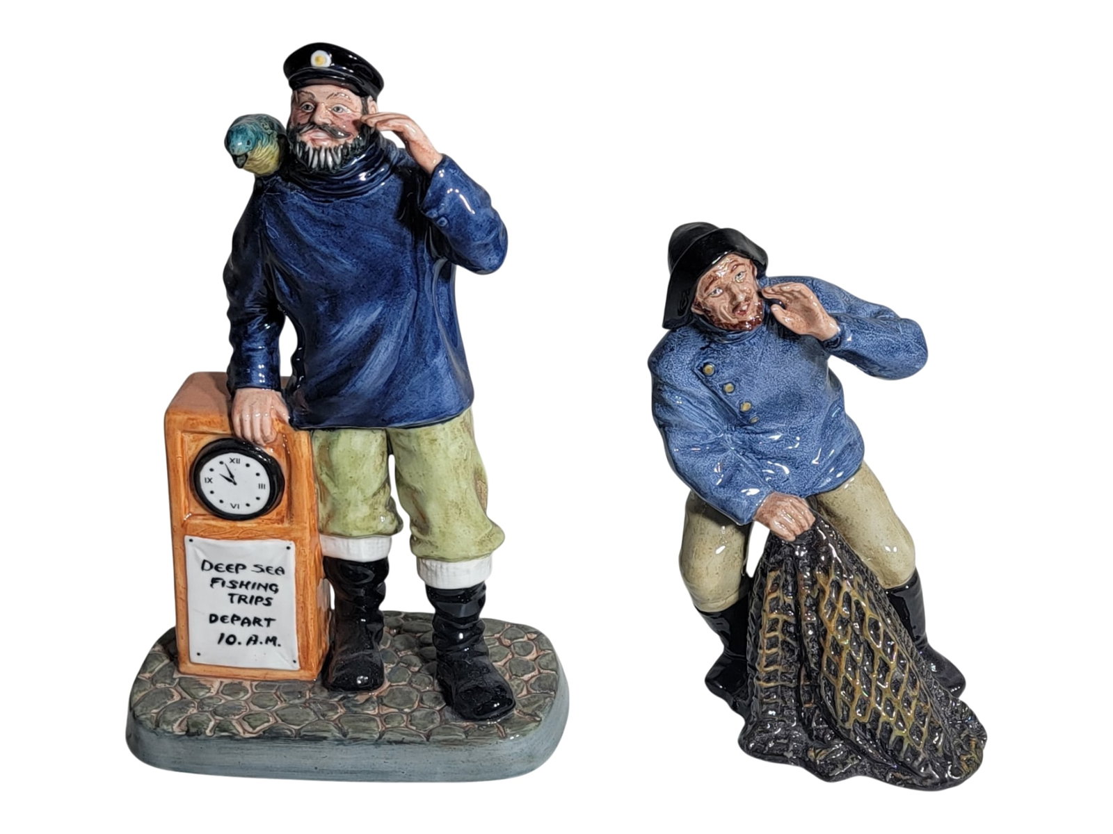 Two Royal Doulton ‘Sea Characters’ Porcelain Figurines, ‘Sea Harvest’ and &#: A matched pair of Royal Doulton English bone china figures from the company’s maritime ‘Sea Characters’ series, comprising ‘Sea Harvest’ and ‘All Aboard,’ bot