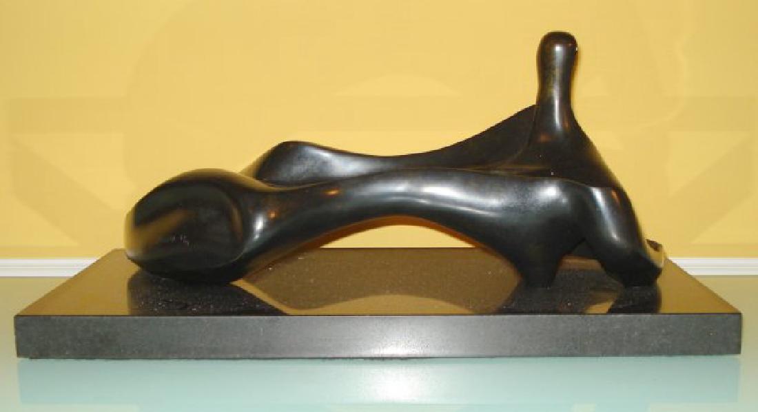 HENRY MOORE LARGE ENGLISH BRONZE NUDE SCULPTURE: HENRY MOORE LARGE ENGLISH BRONZE NUDE SCULPTURE::Henry Moore (ENGLISH, 1898 – 1986). Large bronze sculpture depicting an abstract nude. After Signed Moore and numbered 6/9 Measures: Bronze: 17.5" L
