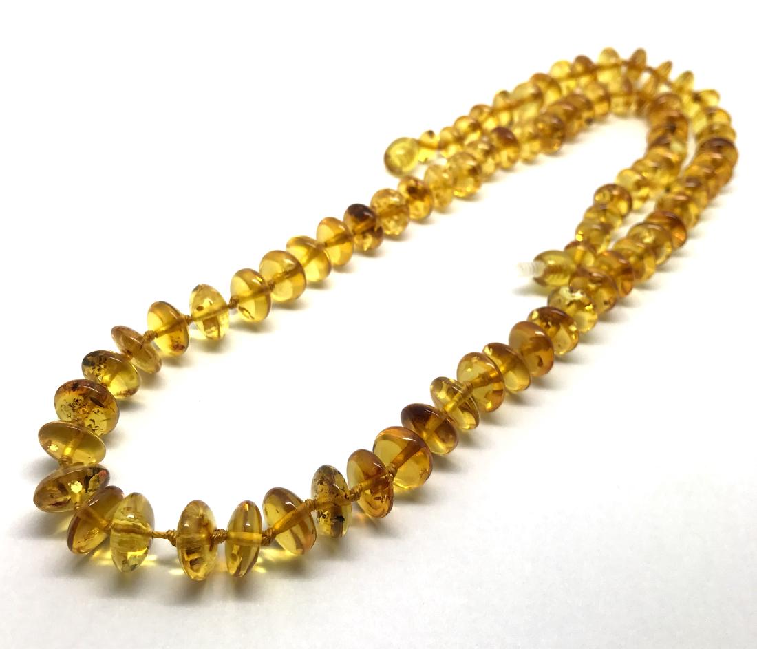 Baltic Amber Necklace Lemon Honey Colour: Materials: Baltic Amber, Colour: Lemon, Honey, Shape: Round, Disk, Size: Bead: 10mm, Length: 58cm (Please refer to the pictures), Total Weight: 19,55g
