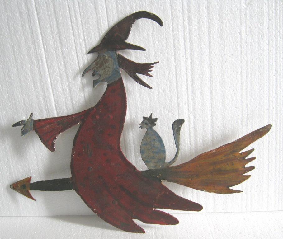 Iron halloween witch on broom: Iron halloween witch on broom . Size : 14.25 x 18.70 x 1.00 inch .