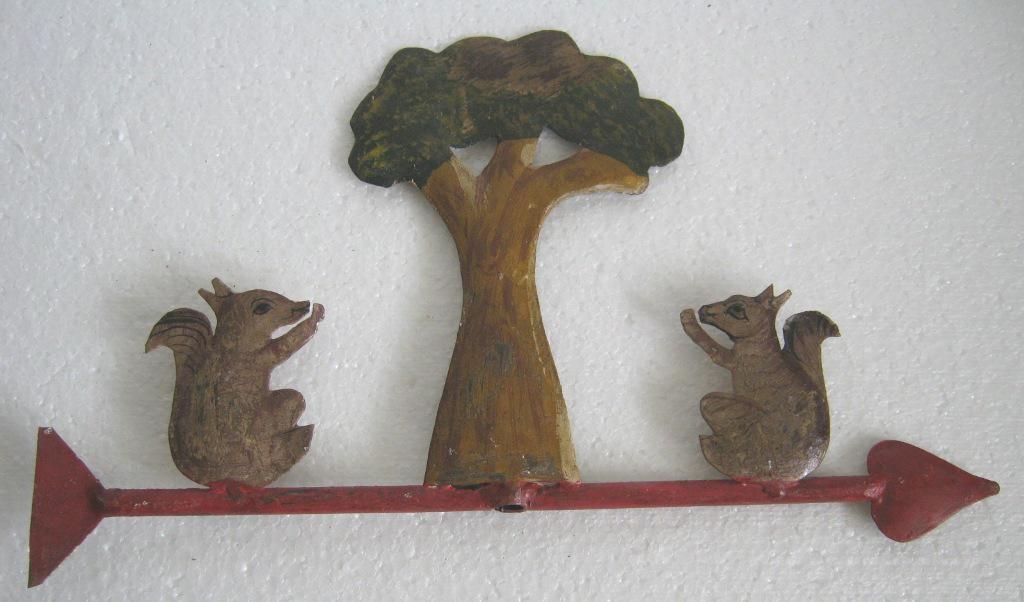 Two squirrels under tree weather vane (1 of 6)
