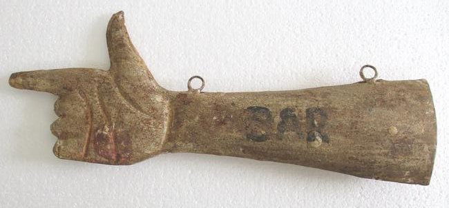 Iron hand direction trade sign advertisement . BAR (1 of 7)