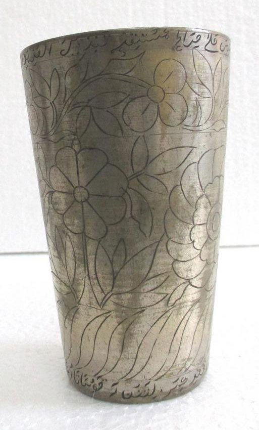 Brass glass beaker , flower and leaf design , signed: Brass glass beaker , flower and leaf design , signed . Size : 5.00 x 3.00 x 3.00 inch .