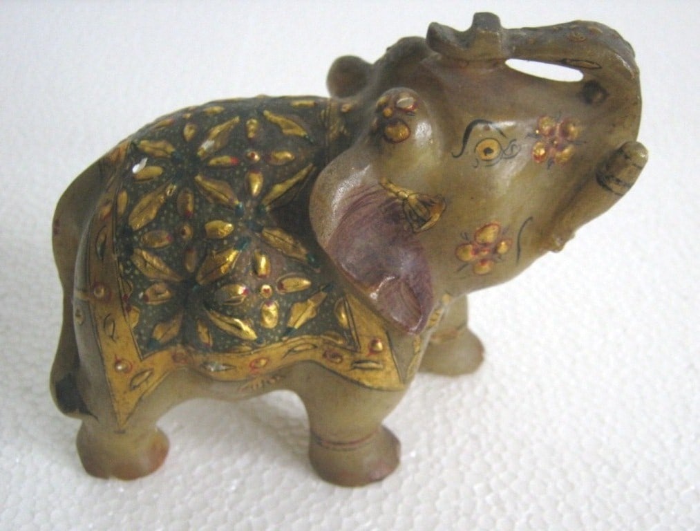 Marble elephant with gold decoration (1 of 8)