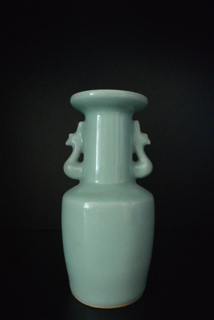 Chinese Longquan Celadon Mallet Double Ear Vase: Longquan Kiln Banghao Shuang Feng ear plate mouth Size: Height: 18cm. Bottle small mouth, straight neck, fold shoulder, straight abdomen, circle foot. Neck on both sides of the set of a phoenix for th