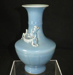 A Chinese Rare Porcelain Sky Blue Vase Qian-Long: 清代乾隆 天蓝釉雕塑龙纹瓶: 珍品 拍品尺寸：H:21cm, W:12cm.