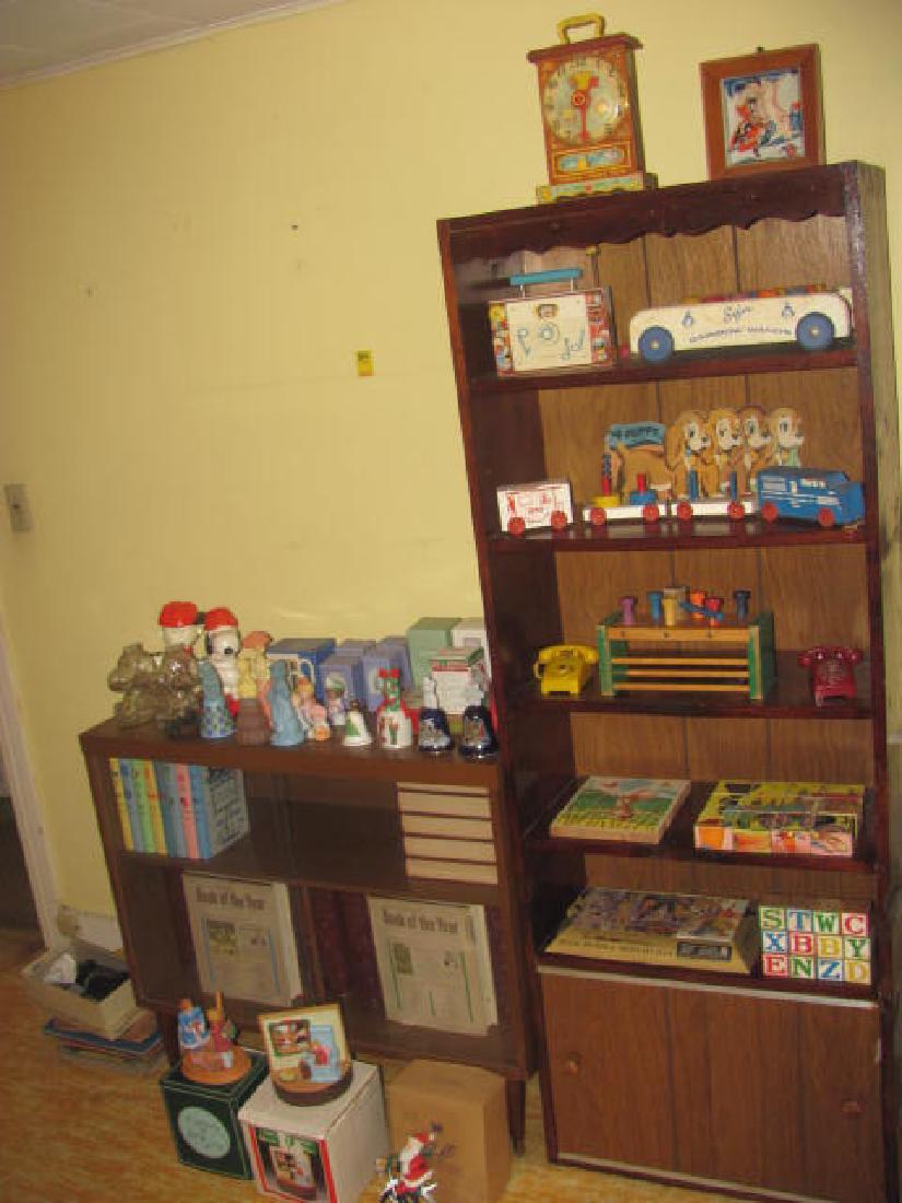 Fisher Price Toys Avon Bookcases: This lot consists of Fisher Price toys, Avon, Books, Records, Bookcases, Encyclopedias