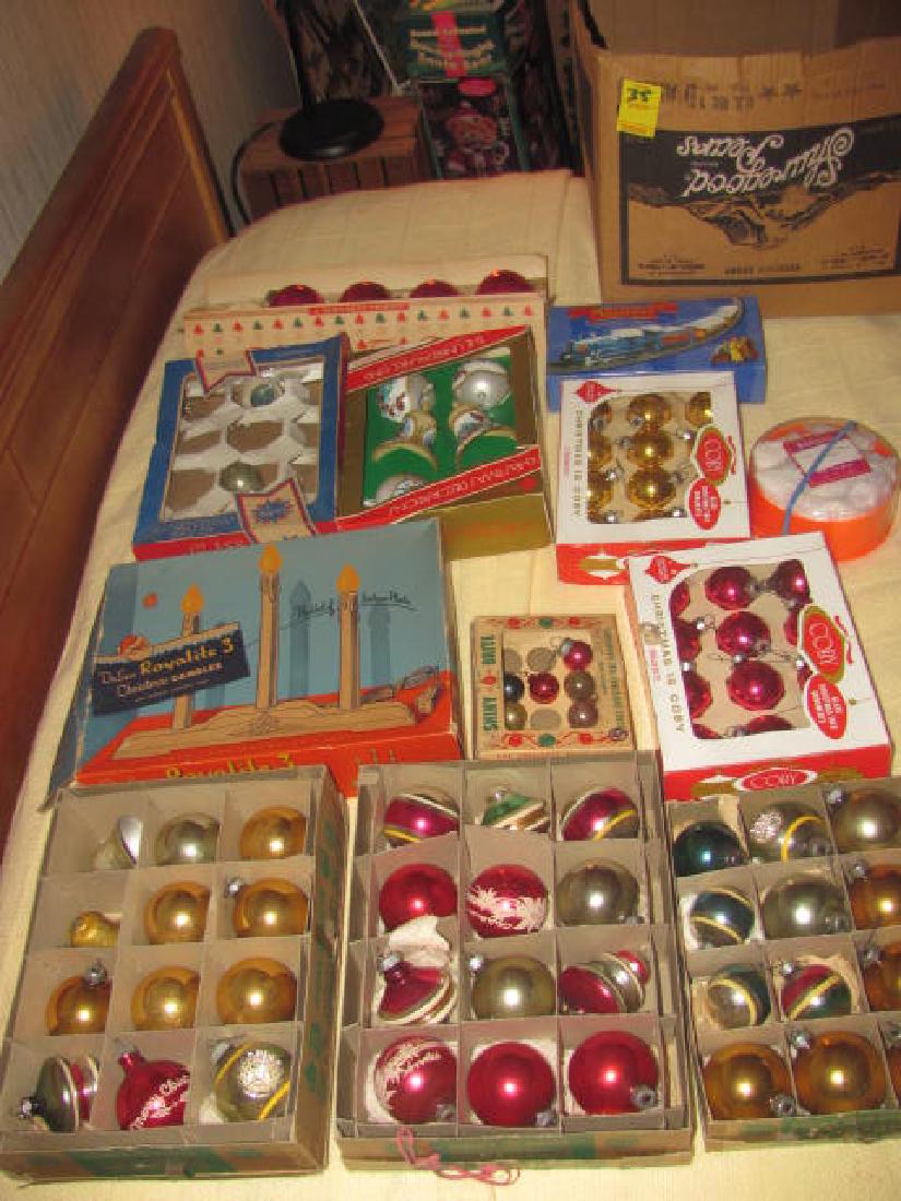 Boxes of Vintage Christmas Balls: This lot consists of vintage christmas balls, Candles