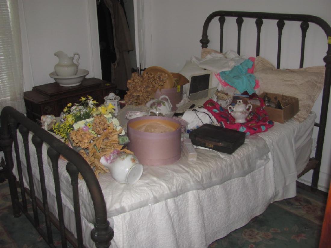 Iron Bed: Contents sold seperately. This is not brass. Dimensions are approx. 54"x80"