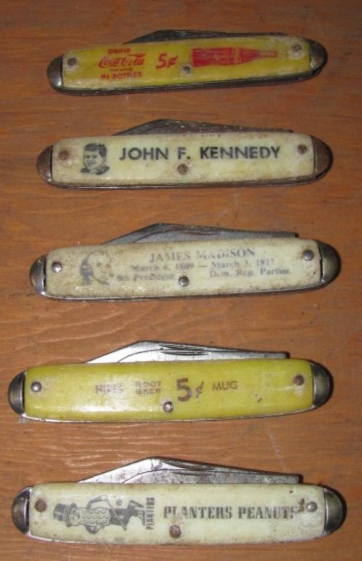 Vintage Pocket Knives: Includes Coca Cola, John F Kennedy, James Madison, Hires Root Beer, & Planters Peanuts. Have some light rust on blades from storage.