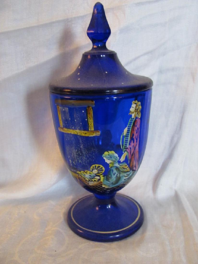 Hand Painted Fenton Covered Jar: Religius Scene, Signed K Riley. Approx. 4 1/4" in diameter and 10" tall