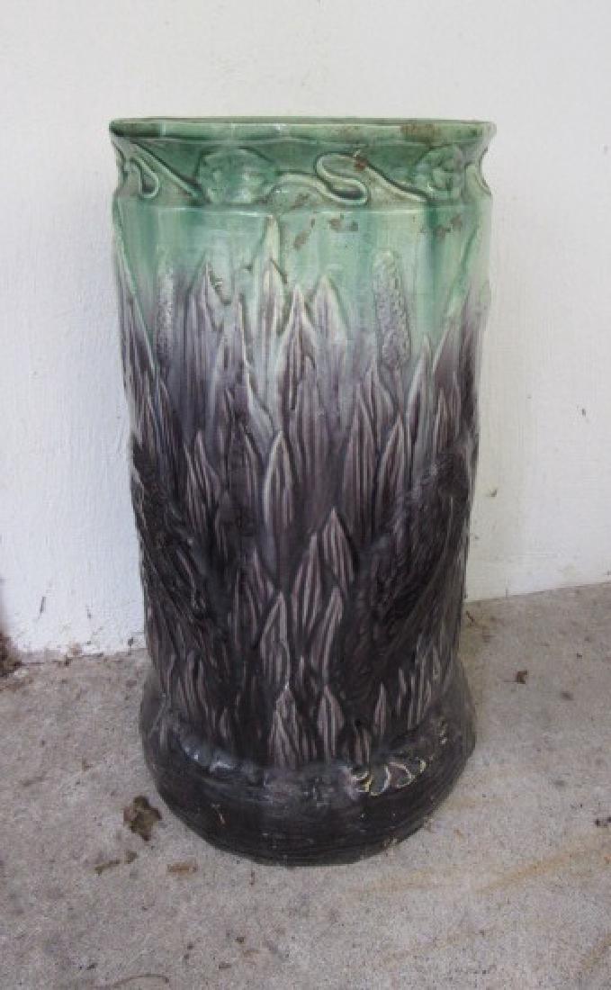 Umbrella Stand: Approx. 10" in diameter and 21" tall. Sounds like it has a crack