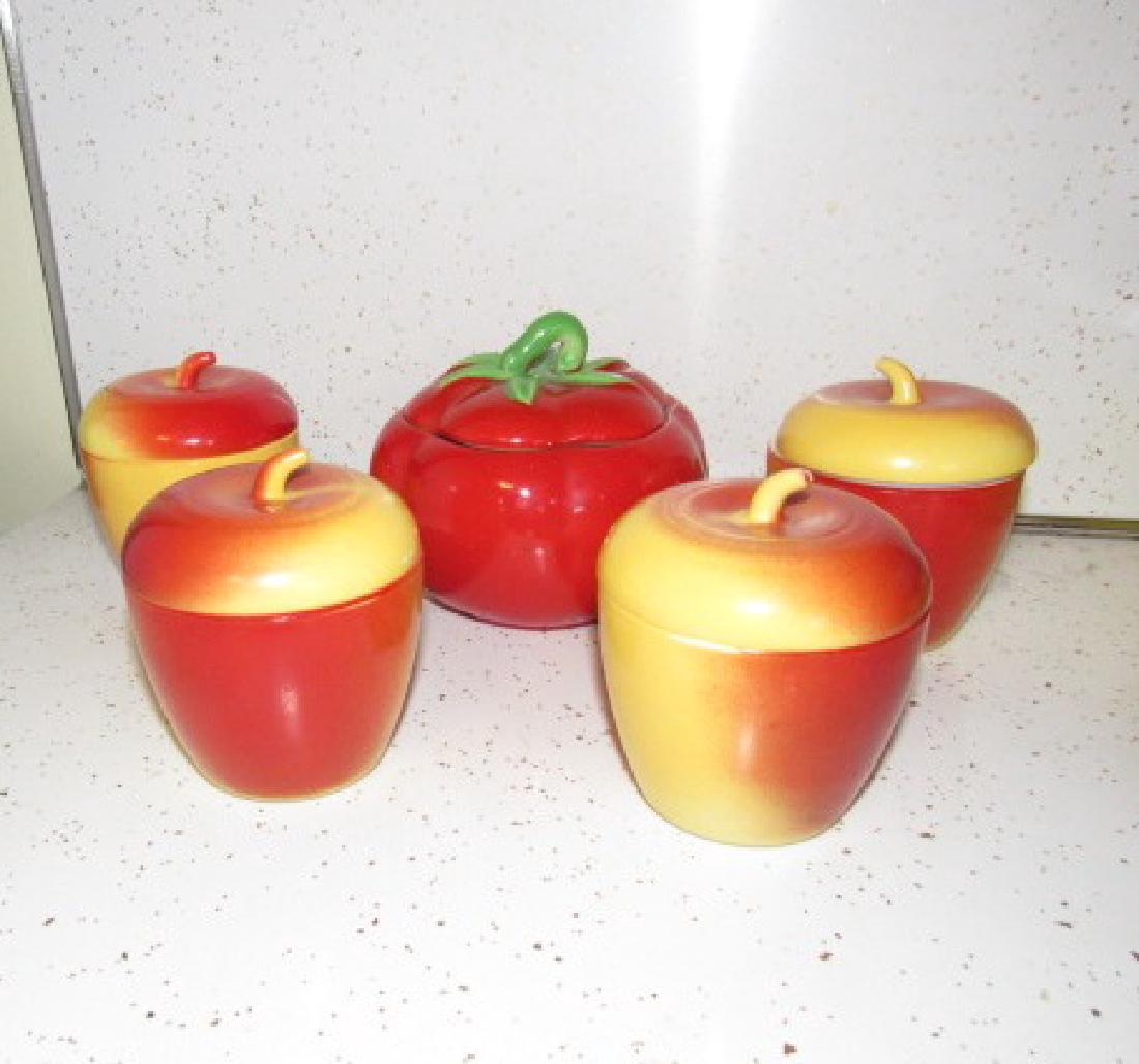Tomatoe & Apple Canisters: Tomatoe has cracking to lid. Apples are good and approx. 4" tall.
