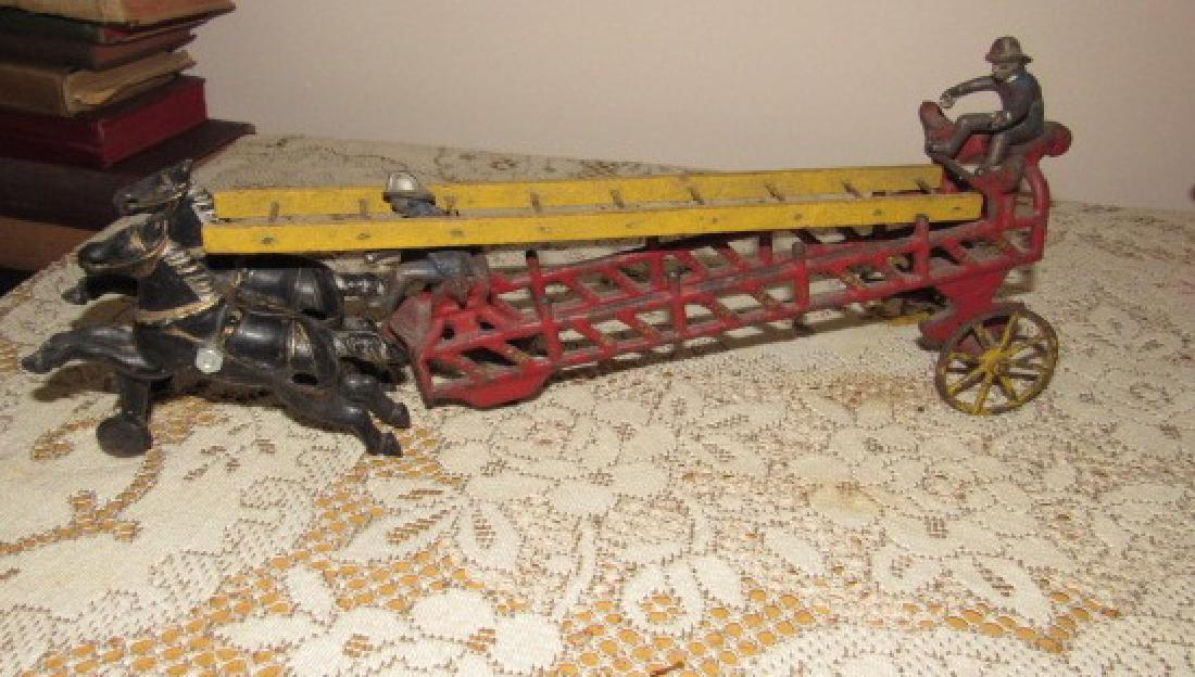 Cast Iron Horse Drawn Fire Truck Toy: Trailer is approx. 11" long