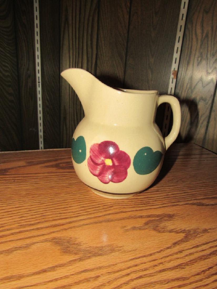Watt Pitcher: Approx. 6 1/2" tall. MIGHT have small chip on spout.